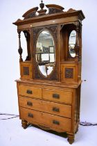 A large Victorian mahogany mirrored sideboard/cupboard with central mirror and side panels, pediment