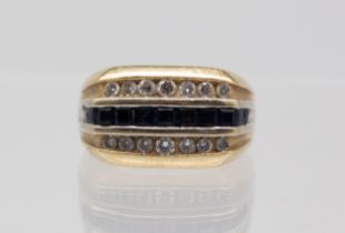 A gents sapphire and diamond 14ct gold dress ring, comprising a central row of channel set calibre