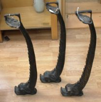 Three patinated cast brass classical dolphin tripod table legs, each 72cm tall.