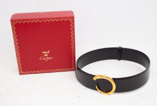 A new black leather Cartier belt, the Cartier 'C' panther on the buckle, 1980s/90s, comes with