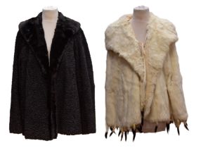 An Ermin fur cape with large cowl collar and Ermin tails (late 1930s/early 1940s). A astrakan jacket
