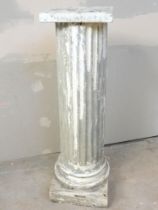 A hand painted faux marble classical column torchere of fibreglass & wood construction. Height 109cm