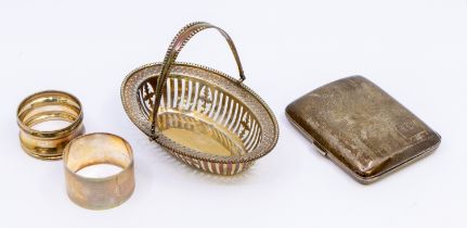 A collection of silver items to include; a George V silver cigarette case, banded engine turned