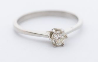 A diamond and 18ct white gold solitaire ring, claw set round brilliant cut diamond approx 0.20ct,