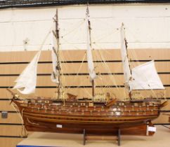 A large hand made model of a French wars galleon/war ship on stand.