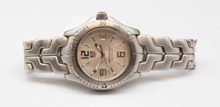 A Gents steel cased Tag Heuer Professional wristwatch, comprising a signed silvered dial, with