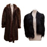 A mountain goat black fur coat, 1920s/30s, the astrakan collar is worn but not noticeable under