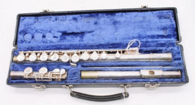 An Elkhart Industries, Gemeimhardt flute in case, untested but generally looks in good condition.