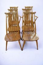 A set of six mid 20th Century Ercol dining chairs including two carvers.