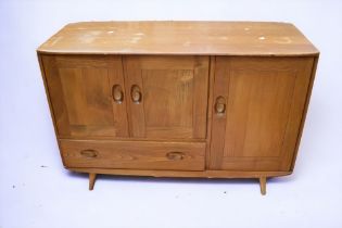 Two mid 20th Century Ercol matching dining room cabinets.