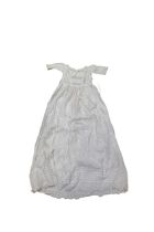 A pure silk 1920s shawl with silk tassels, a children's night dress, babies pants (iron mold mark