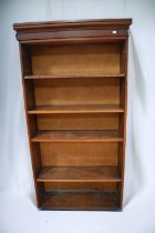 Four shelf Victorian mahogany floor standing bookcase along with a Victorian small cabinet