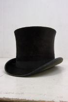 A Macqueen & Co of London black top hat, titled to inside "J. Oulsnam". Inside measurements 19cm x