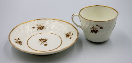 A Swansea Ozier moulded coffee cup and saucer