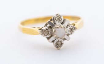 A diamond and opal 18ct gold cluster ring, small central opal within a border of small diamonds,