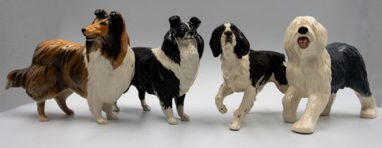 A small collection of Beswick Dogs