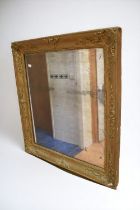 An early 19th Century Regency wall mirror with original pier glass, wood frame with gesso/plaster