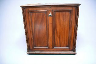 A 19th century estate fitted stationery cabinet, in mahogany, double sides with compartments