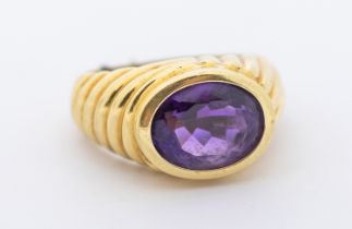 An amethyst and 14ct gold dress ring, comprising an oval mixed cut amethyst approx 10 x 8mm,