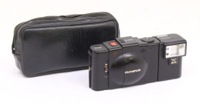 Olympus: A cased Olympus XA2 camera. Untested for working order. Please assess photographs.