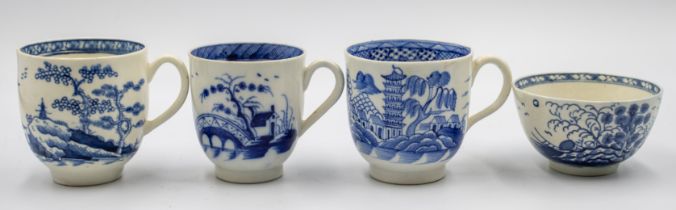 A Worcester blue and white tea bowl and three cups