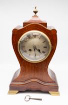 An Edwardian 8 day mahogany inlayed mantle clock with round silvered dial, Roman numerals, box