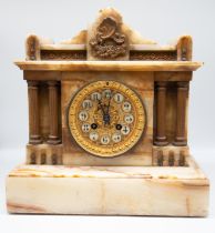 19th century French alabaster striking mantel clock of classical form with gilt and enamel dial.