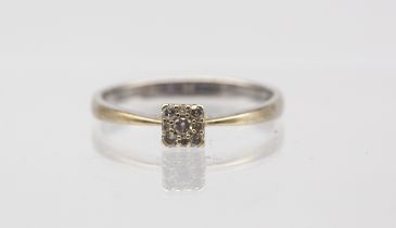 A diamond and 9ct white gold cluster ring, comprising a square mount grain set with small