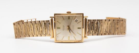 A Gentleman's 1950's Orisa 14ct gold automatic wristwatch, comprising a square signed silvered