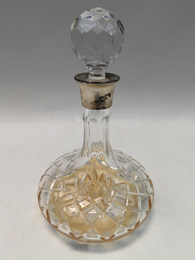 A modern hallmarked silver collared "Ships" decanter, crystal cut glass, London hallmarked ,