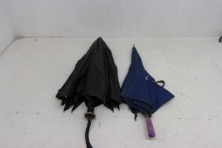 Four vintage umbrellas to include a navy late 1930s with a lilac perspex handle, the spindle ends