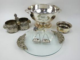 Two silver decanter labels, a silver plated punch bowl, wine coasters, bottle holder, ice tongs etc