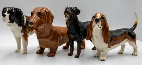 A small collection of Beswick dogs