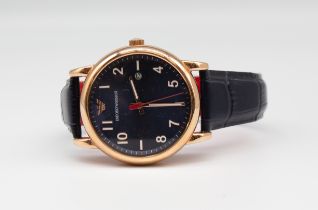 A gents Emporio Armani rose gold plated wristwatch, comprising a signed round metallic blue dial