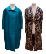 A shot silk deep teal coat by Kenneth Kemperley of Nottingham & Newark with three-quarter length