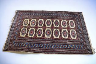 A mid 20th Century hand knotted Southern Persian rug with red and blue ground borders surrounding