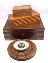 A 19th Century trinket box along with two other trinket treen boxes and an early 20th Century oak