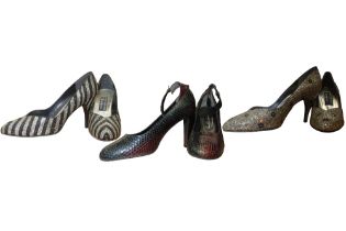 A collection of shoes to include a brown snakeskin 4" heel, shoe with ankle straps by Martine