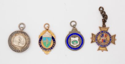 Sporting: A collection of four medallions to comprise: 9ct gold Birmingham Walking Club,