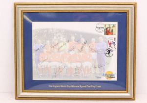 World Cup: A framed and glazed, signed First Day Cover. Signed by ten players, missing only Bobby