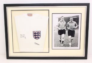 England: A framed and glazed replica England shirt, signed by Tom Finney and Nat Lofthouse; together