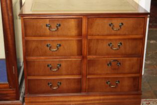 20th C Double filing cabinet four drawers with leather top in mahogany frame.