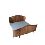 A 20th century French style walnut and rattan cane work super king size bed and mattress. (1)