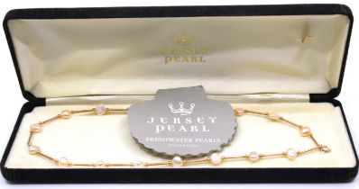 14 Carat Gold Freshwater Jersey Pearl Necklace. Comes boxed with guarantee.  The Necklace contains