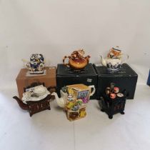 A collection of novelty collectable teapots to include teapots by Paul Cardew; Cheshire Cat