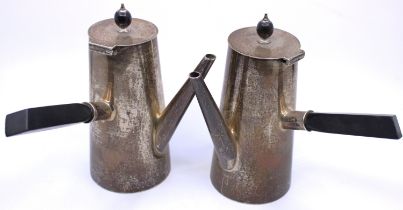 Two Sterling Silver Cafe Au Lait pots with Ebony handles and finials.  One of them has the makers