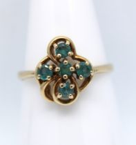 9ct Yellow Gold Five Stone Alexandrite Dress Ring. The size of the Round Brilliant Cut Alexandrite