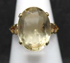 9ct Yellow Gold Oval Brilliant Cut Citrine Quartz Solitaire ring with heart shaped motifs