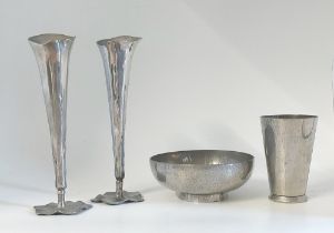 A Keswick pewter hammered bowl and beaker and a pair of pewter tulip organic vases on petal hammered