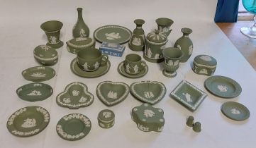 A collection of sage green Wedgwood 20th C jasperware , to include the full set of card suits , a